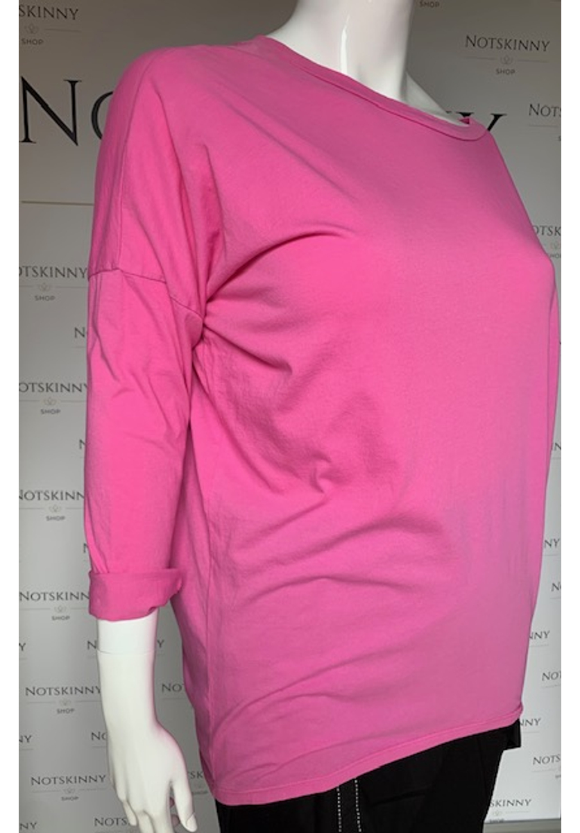 Rózsaszínű hátul hosszabb női felső vagy tunika